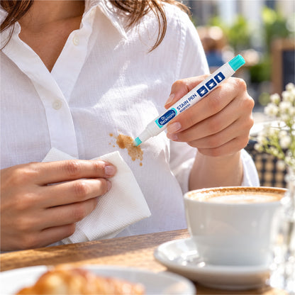 Illustrative lifestyle scene of Stain Pen Express used on a fresh coffee stain on a cotton shirt